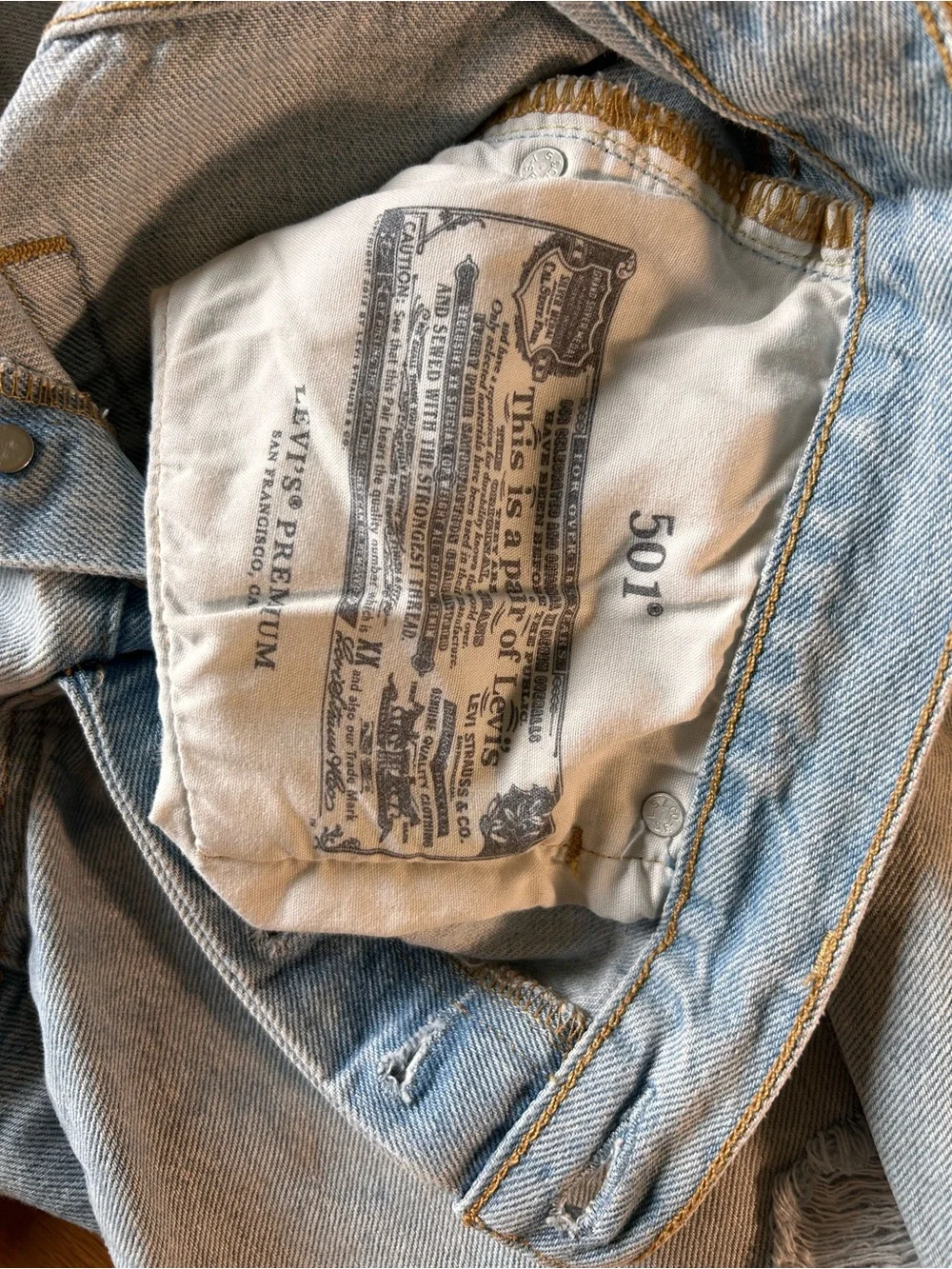 Levi's distressed light wash long denim button fly jean shorts size 28